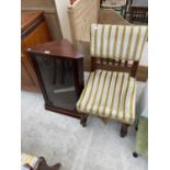 A SMALL MAHOGANY CORNER CABINET WITH GLAZED DOOR AND AN OAK DINING CHAIR