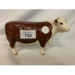 A BESWICK HEREFORRD COW WITH BOX