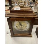 A MAHOGANY MANTLE CLOCK FRANZ HERMLE