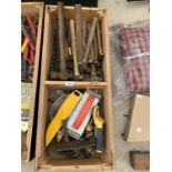 A WOODEN BOX CONTAINING HAMMERS AND FURTHER TOOLS