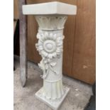 A TALL DECORATIVE COLUMN/PLANT STAND