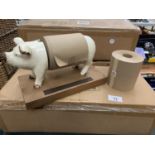 FOUR NEW CAST PIG NOTE ROLL HOLDERS WITH ROLLS