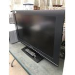 A PANASONIC 31 INCH TV WITH REMOTE, IN WORKING ORDER