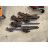 SEVEN STILSONS AND AN ADJUSTABLE SPANNER