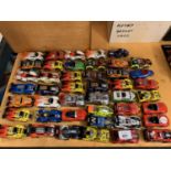 A LARGE COLLECTION OF HOT WHEEL STYLE CARS