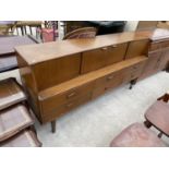 A PORTWOOD FURNITURE RETRO TEAK SIDEBOARD WITH TWO DOORS AND SIX DRAWERS