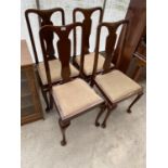 FOUR MAHOGANY DINING CHAIRS ON CABRIOLE SUPPORTS