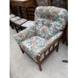 AN OAK CONSERVATORY ARMCHAIR