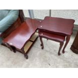 A MAHOGANY COFFEE TABLE WITH WOVEN LOWER SHELF AND A MAHOGANY NEST OF TWO TABLES