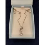 A BOXED PAVE SILVER NECKLACE SET
