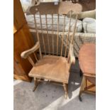 A BEECH HIGH BACKED ROCKING CHAIR