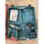 A BOSCHMANN RECHARGABLE DRILL WITH CHARGER AND CASE, IN WORKING ORDER