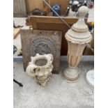 A LARGE URN, URN PLANTER (A/F) AND A MOUNTED CAST IRON CIRCLE