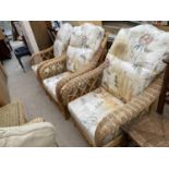 THREE WICKER CONSERVATORY ARMCHAIRS