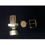 A LADIES WRIST WATCH MOVEMENT (BELIEVED ROLEX), A WATCH CLASP (BELIEVED PLATINUM) AND A WATCH