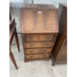A SMALL MAHOGANY BUREAU WITH FALL FRONT, FOUR DRAWERS AND RED LEATHER WRITING SURFACE