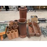 A COLLECTION OF TERRACOTTA ITEMS TO INCLUDE TROUGHS, POTS ETC (SOME A/F)