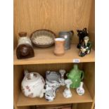 VARIOUS CERAMICS TO INLCUDE A STONEWARE BOTTLE, TEAPOTS, JUGS, SHEPHERD FIGURE, COW JUG ETC