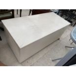 A LARGE WHITE PAINTED BEDDING CHEST