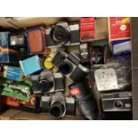 A LARGE COLLECTION OF VARIOUS CAMERAS AND LENSES WITH CASES