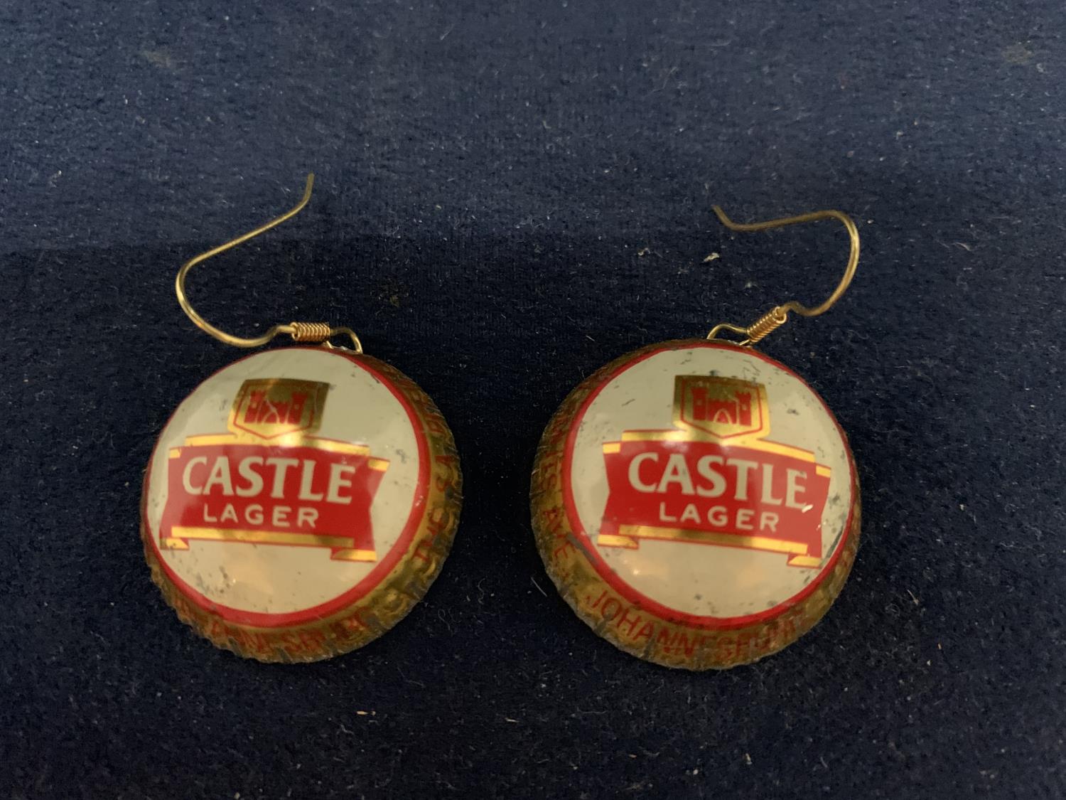 A PAIR OF CASTLE LARGER TOP EARRINGS