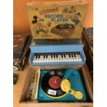 A CHILDS PIANO AND A VINTAGE BOXED MICKEY MOUSE RECORD PLAYER