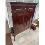 A MAHOGANY CABINET ON CABRIOLE SUPPORTS WITH TWO DOORS AND FIVE SMALL INNER DRAWERS