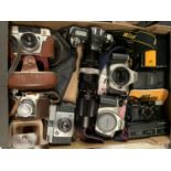 A LARGE COLLECTION OF VARIOUS CAMERAS AND LENSES WITH CASES