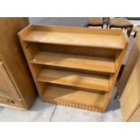 A (POSSIBLY ERCOL) OAK BOOKCASE