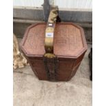 AN ORIENTAL SET OF THREE BAMBOO BASKETS WITH BRASS DECORATION