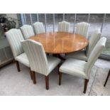 A CIRCULAR MAHOGANY DINING TAB;E AND EIGHT DINING CHAIRS