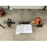 A STIHL KM 85 PETROL MOTOR AND A BOXED ELECTRIC ENGRAVER