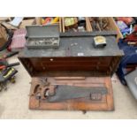 A VINTAGE JOINERS CHEST WITH TOOLS TO INCLUDE SAWS, DRILL, CUTTING TOOLS ETC