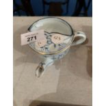 AN ORIENTAL BLUE AND WHITE FEEDING CUP