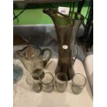 A VINTAGE SMOKY GLASS LEMONADE DRINKS SET COMPRISING OF ONE JUG, ONE PITCHER AND FOUR GLASSES