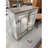 A PAINTED PINE CABINET WITH TWO DOORS