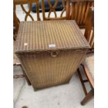 A LLOYD LOOM STYLE LINEN BASKET