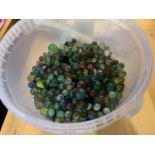 A LARGE BUCKET OF MARBLES