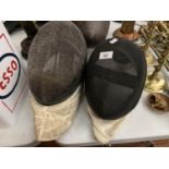 TWO FENCING MASKS