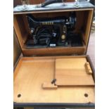 A SINGER SEWING MACHINE EK592153 WITH CASE