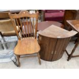 AN OAK BOW FRONT CORNER CUPBOARD AND AN OAK DINING CHAIR