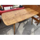 AN ERCOL WINDSOR DINING TABLE