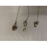 THREE SILVER NECKLACES TO INCLUDE A MUSHROOM, CHAIR AND KEY