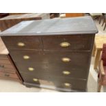 A STAINED OAK CHEST OF TWO SHORT AND THREE LONG DRAWERS