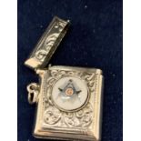 A SILVER VESTA CASE WITH PAINTED ENAMEL