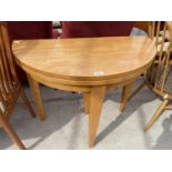 A BEECH DEMI LUNE FOLDING TABLE