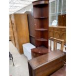 A MAHOGANY CORNER CABINET AND AN MAHOGANY DROP LEAF DINING TABLE