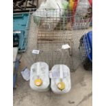 A CROW TRAP AND TWO DRUMS OF ANTIFREEZE PROTECTOR