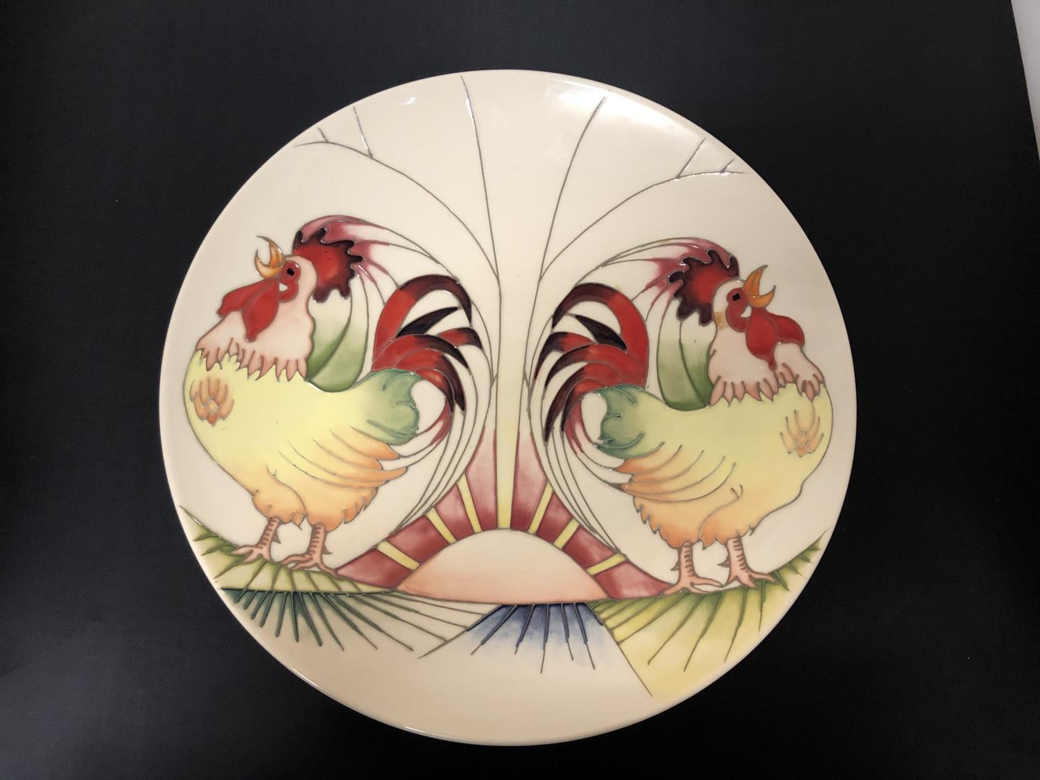 A MOORCROFT 12 INCH PLATE 'GOOD MORNING ROOSTERS'