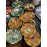 A COLLECTION OF MAJOLICA PLATES, TUREENS ETC
